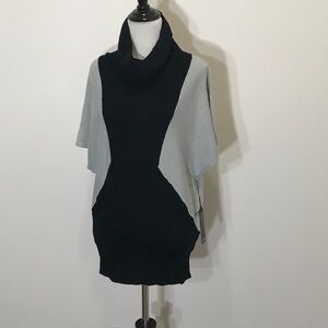 Population color block sweater.